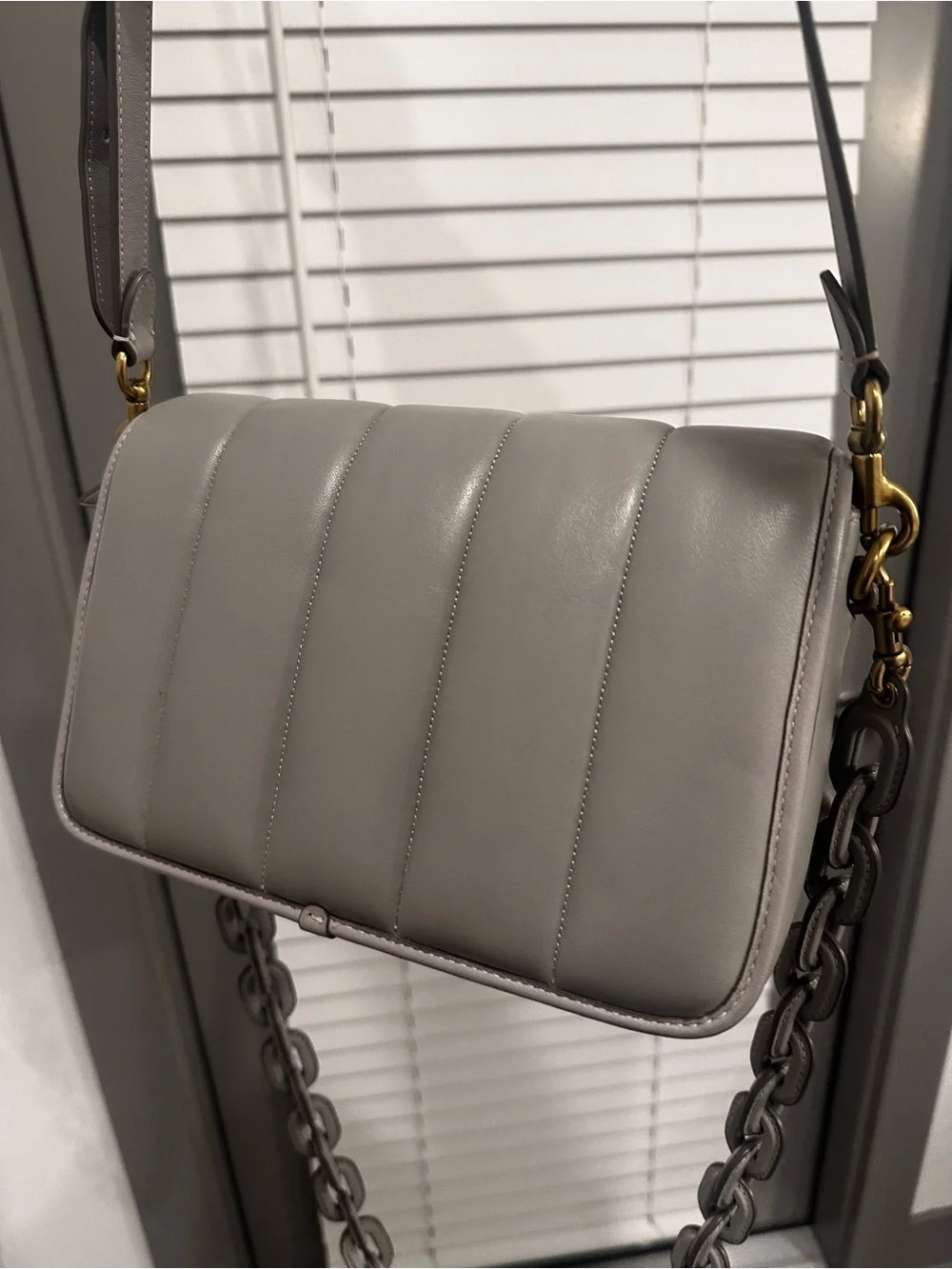 Coach compact quilted